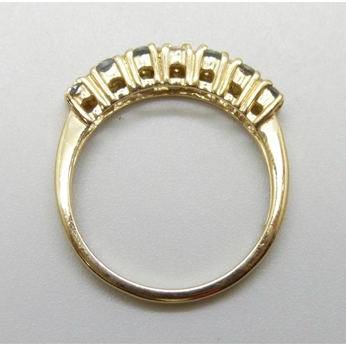 7047 - A 9ct gold, green and white stone ring, 2.3g, N