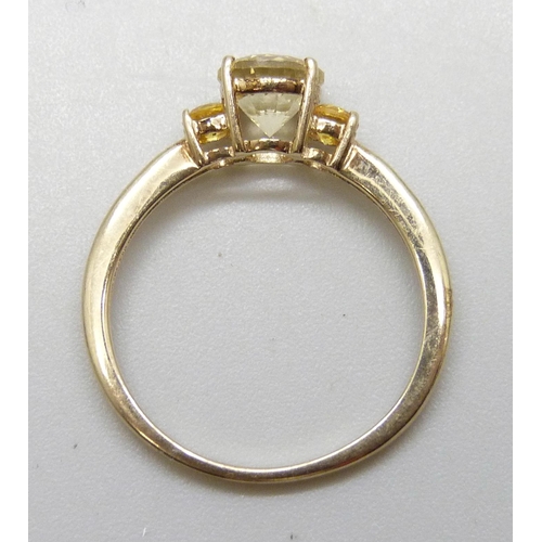 7048 - A 9ct gold three stone ring, 1.6g, N