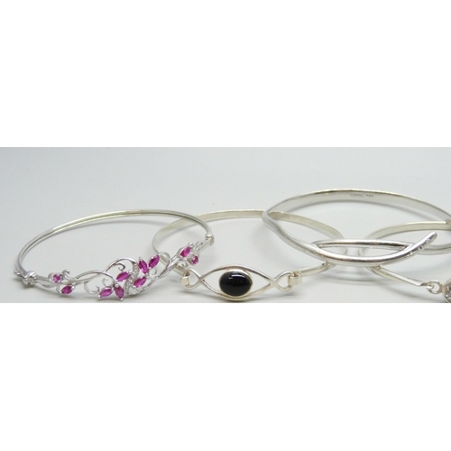 7053 - Six silver stone set bangles including two examples set with diamonds, 73g total