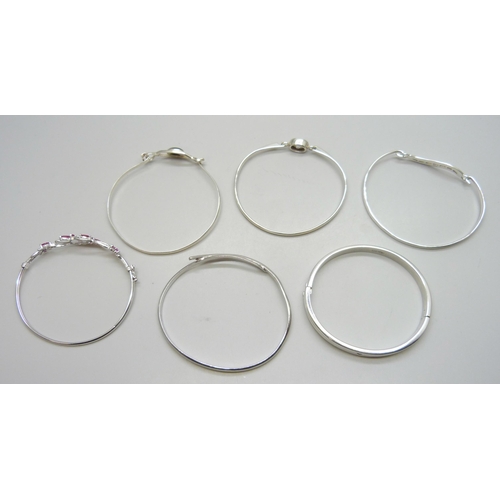 7053 - Six silver stone set bangles including two examples set with diamonds, 73g total