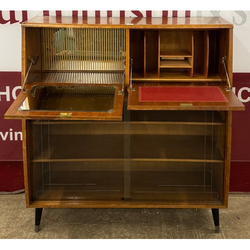 32 - A teak cocktail cabinet
