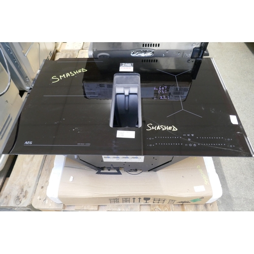 4291 - An AEG venting induction 4 zone hob with Senseboil, and a AEG hob (607-110,221)(Both damaged) *This ... 