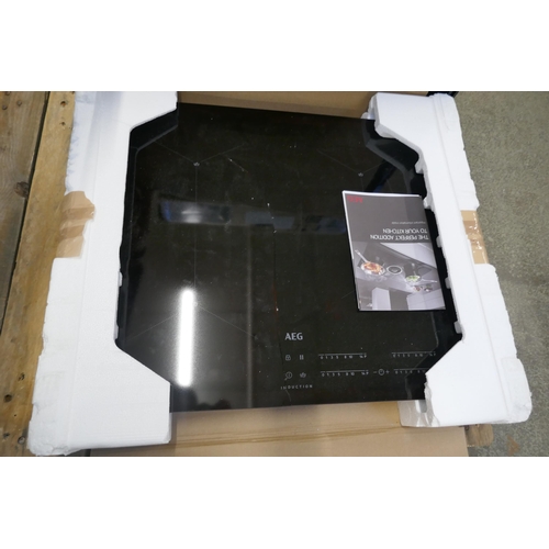 4291 - An AEG venting induction 4 zone hob with Senseboil, and a AEG hob (607-110,221)(Both damaged) *This ... 