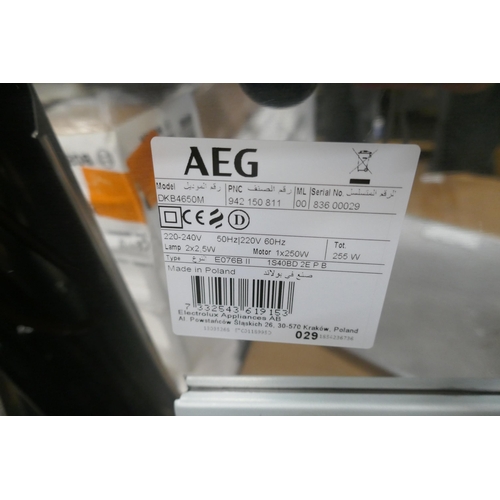 4299 - An AEG chimney cooker hood and a Zanussi cooker hood(607-130) *This lot is subject to VAT