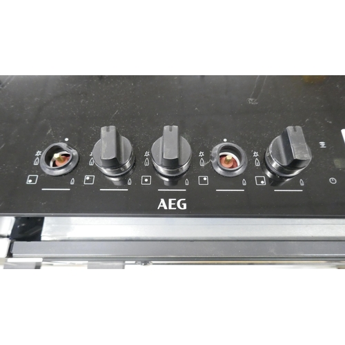 4253 - An AEG induction 4 zone hob with Senseboil, an AEG 5 ring cooker hob (missing parts both damaged) (6... 