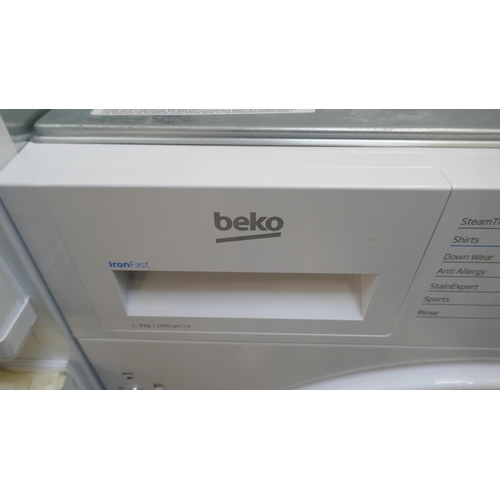 4384 - A Beko 9kg integrated washing machine (Transit damaged)  (607-105) *This lot is subject to VAT