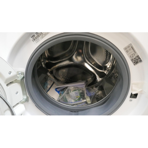 4384 - A Beko 9kg integrated washing machine (Transit damaged)  (607-105) *This lot is subject to VAT