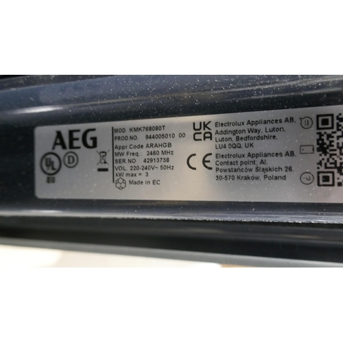 4280 - An AEG microwave (607-125) *This lot is subject to VAT