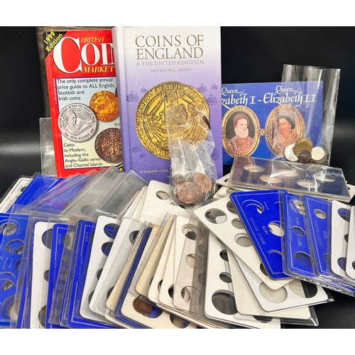 2078 - A collection of coin collecting related items, a coin book, empty wallets, cards, seven empty coin a... 