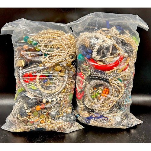 2084 - A collection of costume jewellery, (2 bags)