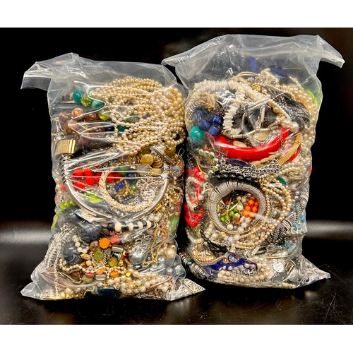 2084 - A collection of costume jewellery, (2 bags)