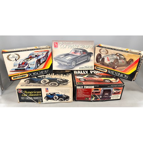2101 - Nine assorted models cars, Humbrol, Matchbox, Ertl, Airfix, etc., all built, with boxes