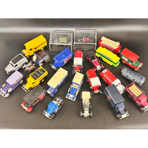 2104 - A collection of over twenty die-cast model cars, Lledo, Days Gone, etc.