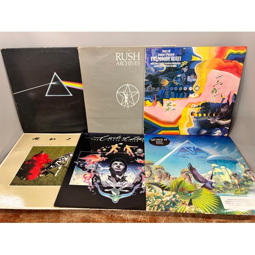 2105 - Twelve rock LP records to include Yes, Pink Floyd, Rush, etc.