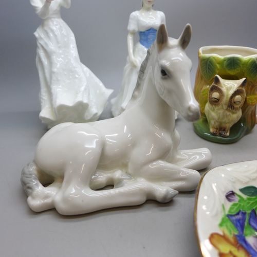 2062 - A collection of china to include two Royal Doulton figures, Nao ducks, Royal Dux mallard duck figure... 