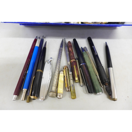 2063 - A box of costume jewellery, pens including Conway Stewart, etc.