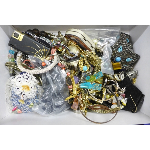 2063 - A box of costume jewellery, pens including Conway Stewart, etc.