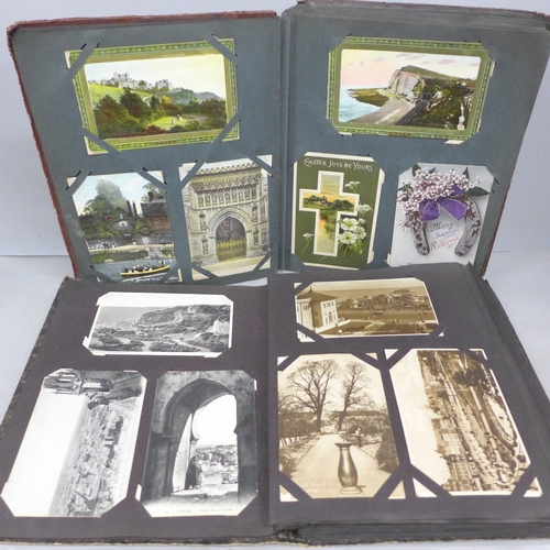 2069 - Two postcard albums with over 200 early to mid 20th postcards