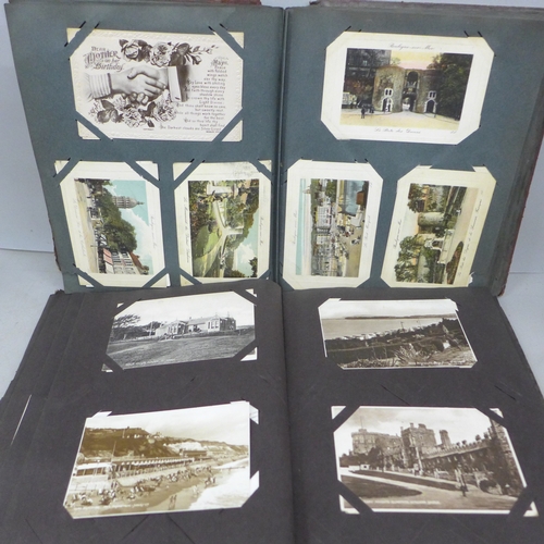 2069 - Two postcard albums with over 200 early to mid 20th postcards