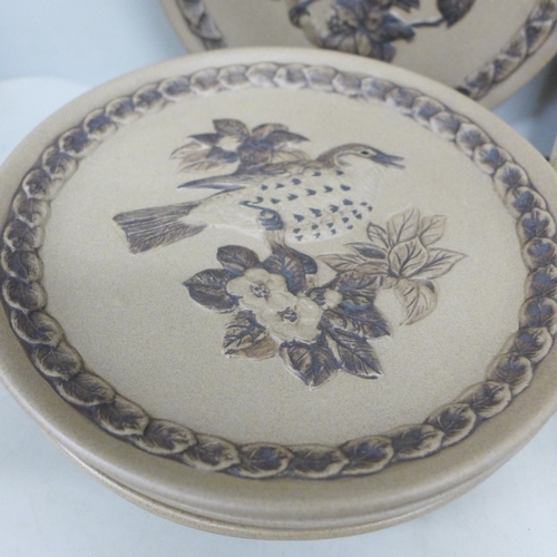 2071 - A collection of Poole pottery including two bird figures and a lidded pot