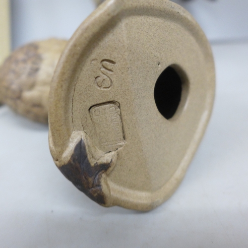 2071 - A collection of Poole pottery including two bird figures and a lidded pot