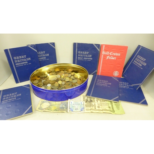 2072 - Coins; ten coin folders, some with coins, a large collection of loose coins including pennies, bank ... 