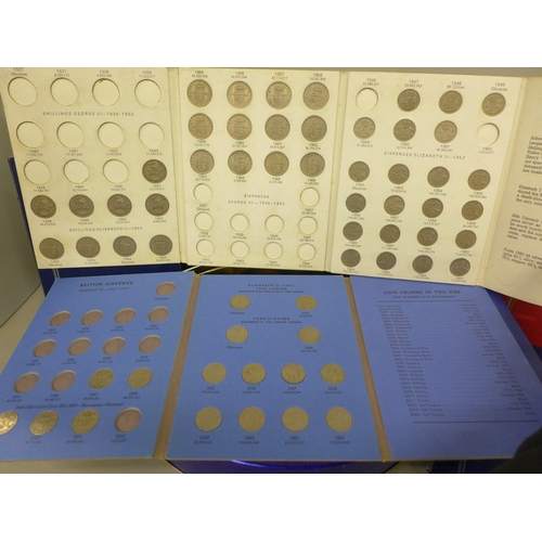 2072 - Coins; ten coin folders, some with coins, a large collection of loose coins including pennies, bank ... 