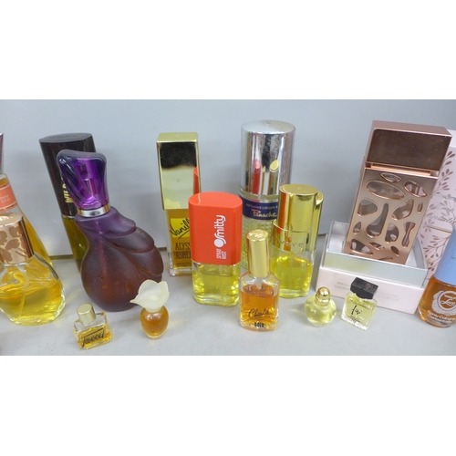 2073 - A collection of perfumes, SJP 'Lovely', Park Avenue, Treika Eau de Toilette, etc.
