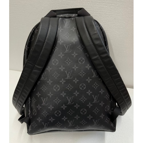 7100 - A Louis Vuitton Discovery backpack, grey/black monogram, approximately 35cm tall, with paperwork (gi... 