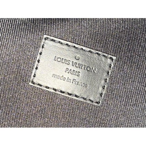 7100 - A Louis Vuitton Discovery backpack, grey/black monogram, approximately 35cm tall, with paperwork (gi... 