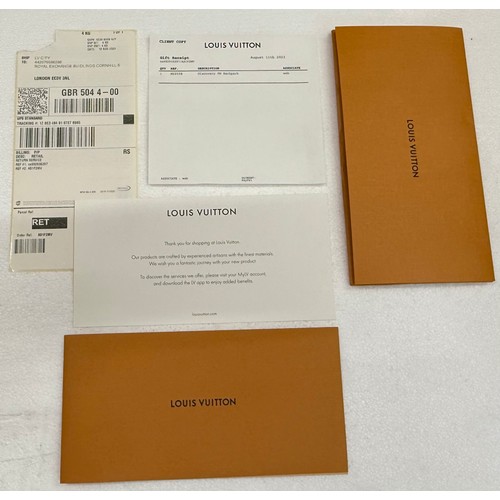 7100 - A Louis Vuitton Discovery backpack, grey/black monogram, approximately 35cm tall, with paperwork (gi... 