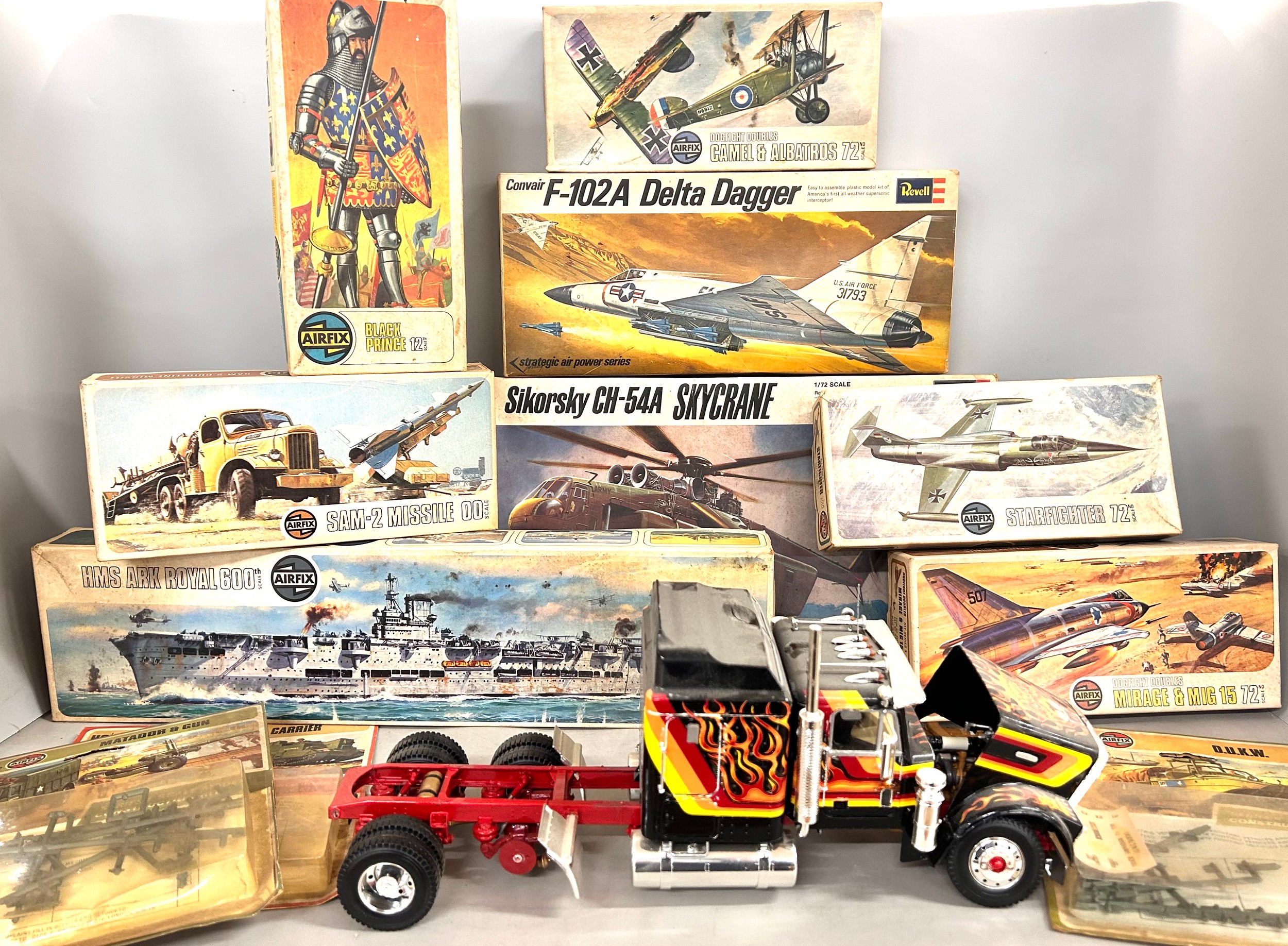 A collection of model boxes, empty boxes, and a part model truck, (part ...
