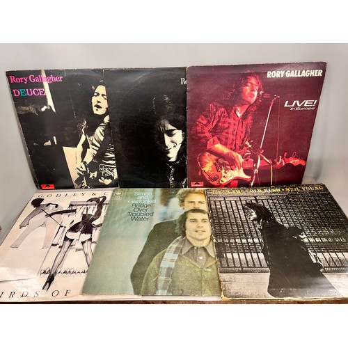 2110 - A collection of sixteen vinyl LP records including Rory Gallagher, Neil Young, Tina Turner, etc.