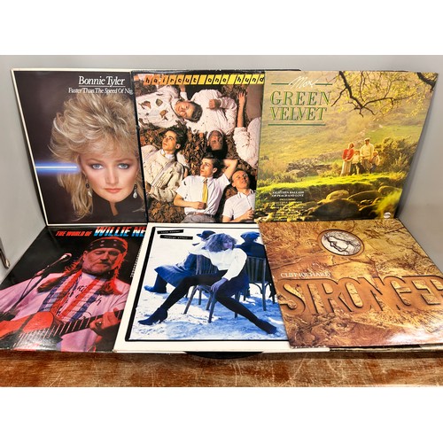 2110 - A collection of sixteen vinyl LP records including Rory Gallagher, Neil Young, Tina Turner, etc.