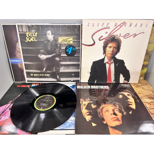 2110 - A collection of sixteen vinyl LP records including Rory Gallagher, Neil Young, Tina Turner, etc.