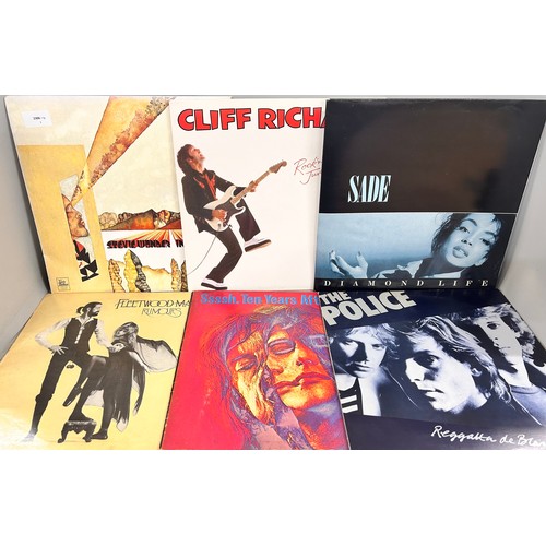 2108 - A collection of eighteen vinyl LPs including, Stevie Wonder, Fleetwood Mac, The Police, etc.