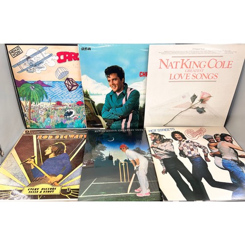 2108 - A collection of eighteen vinyl LPs including, Stevie Wonder, Fleetwood Mac, The Police, etc.