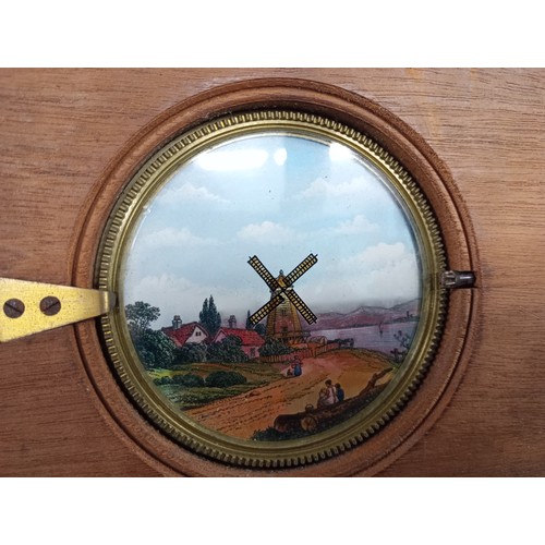 2199 - A large 19th Century wooden and brass magic lantern with three boxes of slides including humour, map... 