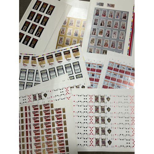 2102 - A collection of fourteen very large Will's and Player's Cigarette uncut sheets of insert cards, incl... 