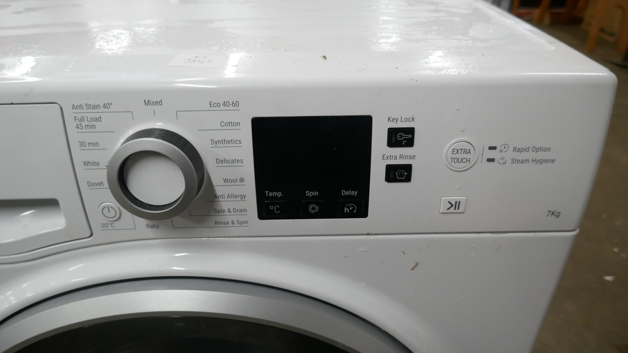 A Hotpoint 7kg free standing under counter washing machine