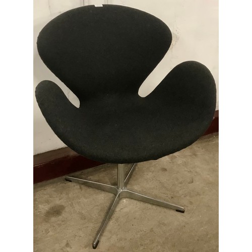 53 - A grey fabric and chrome swan chair