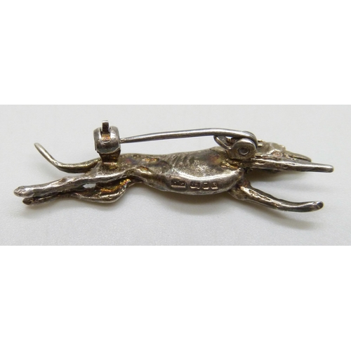 7157 - A silver dog brooch in the form of a racing greyhound, HG, London, 1991, 3.5cm