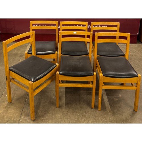 65 - A set of six teak dining chairs