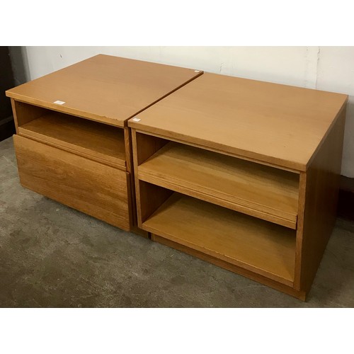 71 - A pair of teak bedside chests of drawers