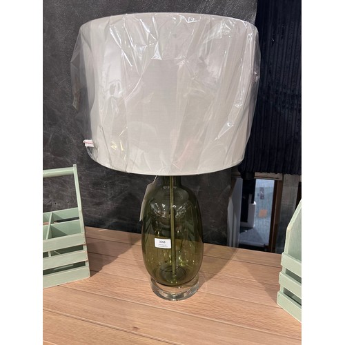 3063 - A green glass table lamp with white shade