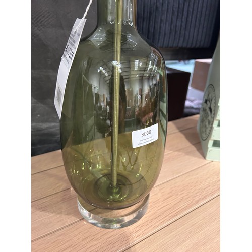 3063 - A green glass table lamp with white shade