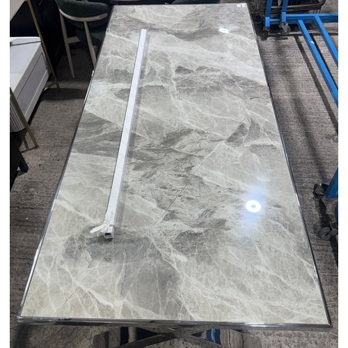 3065 - A large Vanquish chrome and marble effect dining table *This lot is subject to VAT