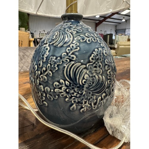 3066 - A blue floral pattern table lamp with white shade