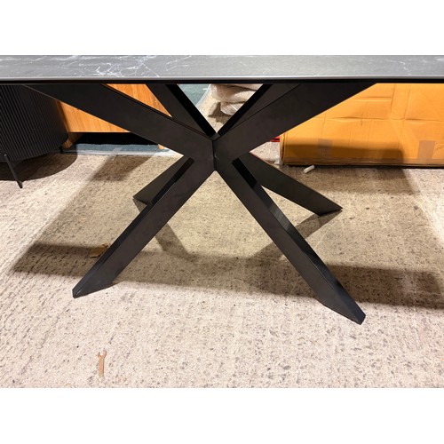 3082 - An Apollo printed black glass dining table *This lot is subject to VAT