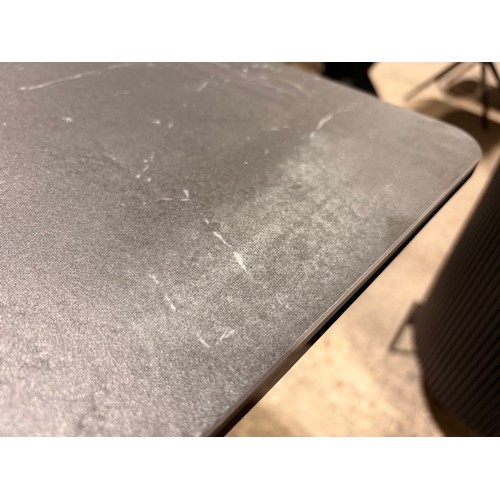 3082 - An Apollo printed black glass dining table *This lot is subject to VAT